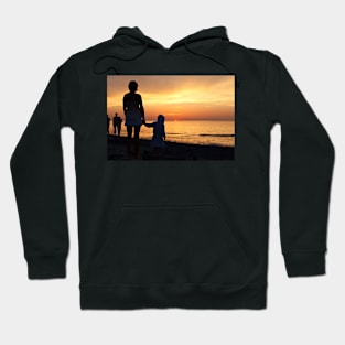 People watching dusk at seaside Hoodie